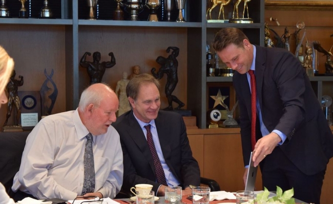 Governor Schwarzenegger video conferences with Charles Clarke and Dean Jack Knott.