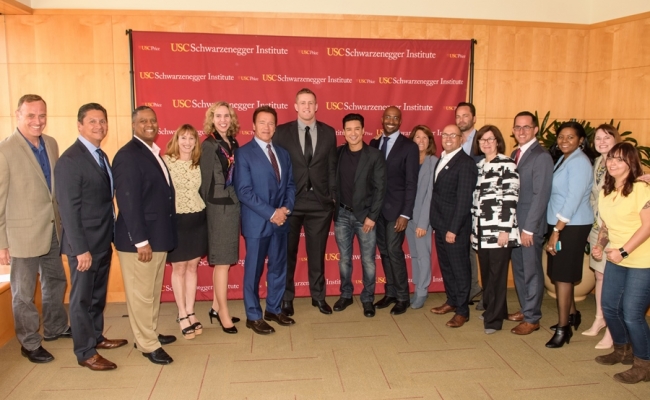 From left: Matt Iseman, Chancellor Eloy Oakley, Gerard Robinson, Jodi Grant, Mayor Jennifer Roberts, Governor Arnold Schwarzenegger, JJ Watt, Mario Lopez, Van Jones, Bonnie Reiss, Ben Paul, Micheal Be