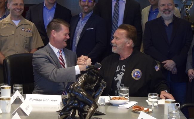 Assistant Secretary of Defense for Indo-Pacific Security Affairs Randall Schriver talks with Governor Arnold Schwarzenegger.