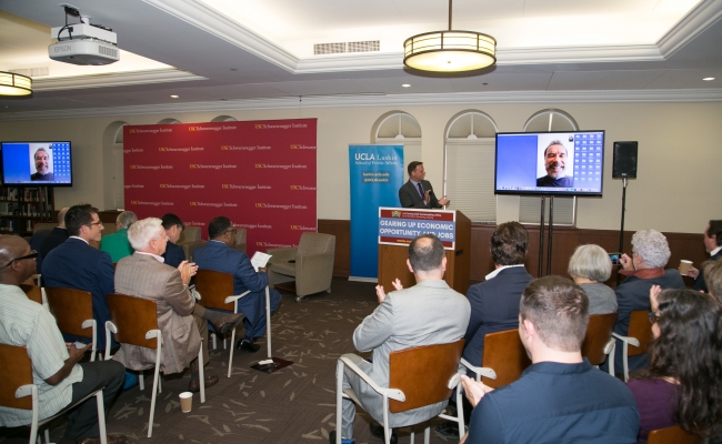 Former California Gov. Arnold Schwarzenegger welcomed the audience over FaceTime video.