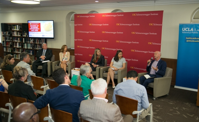 Director of the UCLA Luskin Center J.R. DeShazo moderates a panel featuring Wendy Butts, Ron Miller, Estelle Reyes, and Caroline Torosis.