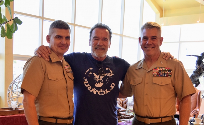 Governor Schwarzenegger talks to Lieutenant General Joseph L. Osterman and Brigadier General Sean M. Salene.
