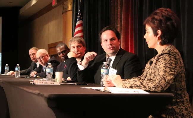 Christian Grose (second from the right) speaks at Arizona State University