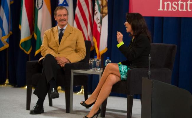 Former President of Mexico Vicente Fox discusses immigration reform with Gabriela Teissier, Univision