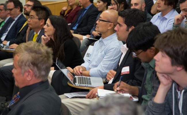 Students and Price faculty engaged in discussion